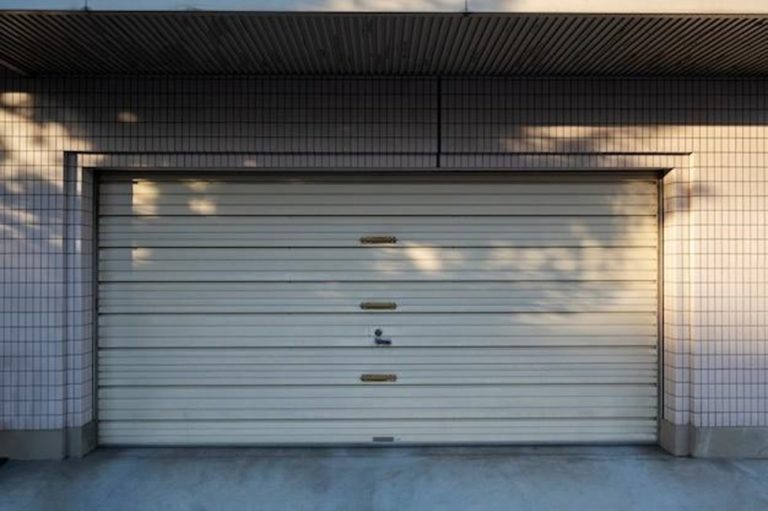 Understanding the Mechanics of Torsion and Extension Garage Door Springs
